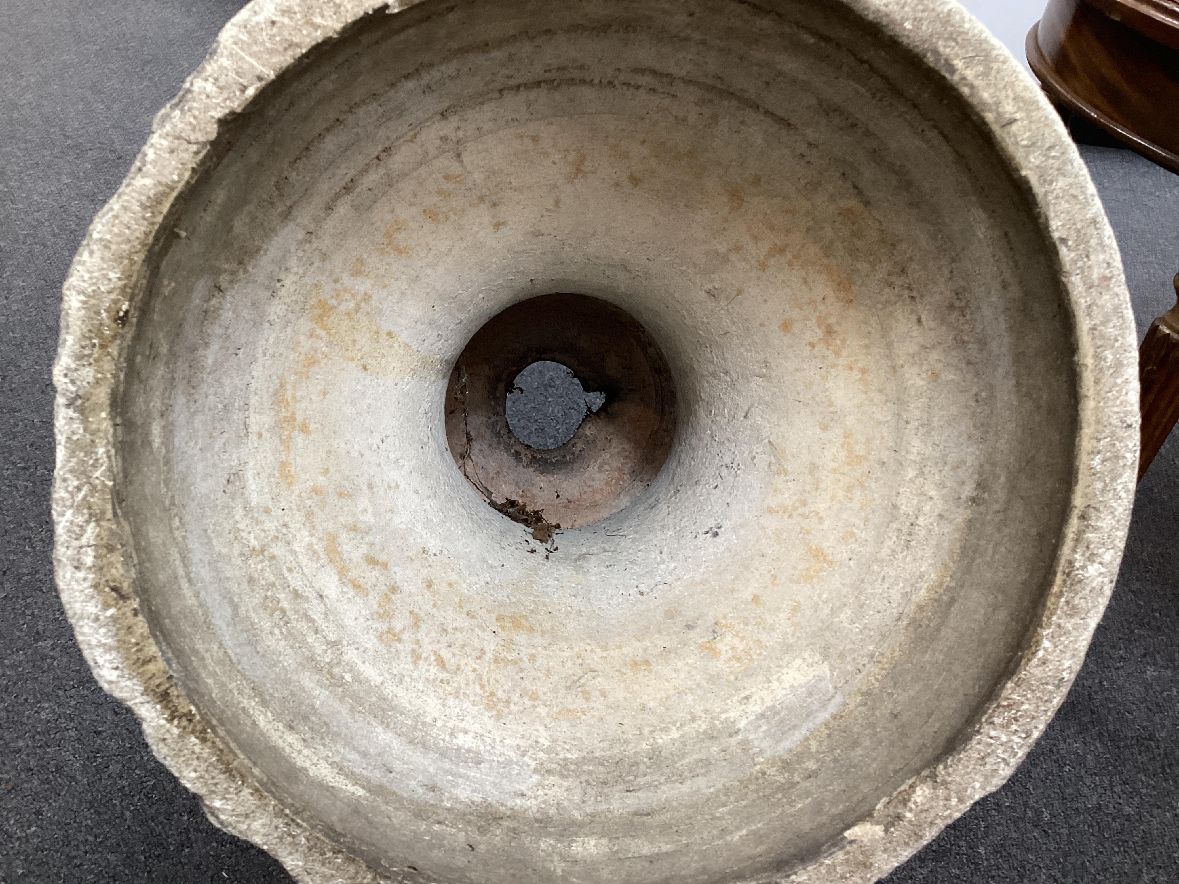 A 19th century circular earthenware urn